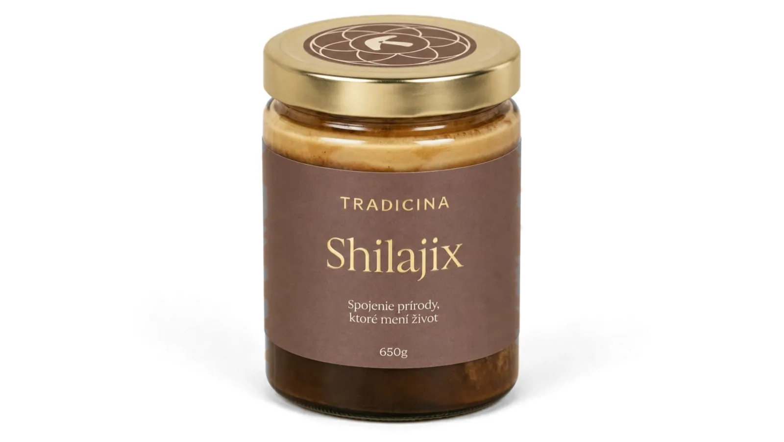 Pohár Shilajix sa otvára, okolo neho sa vznáša shilajit, koralovec ježovitý, čierne korenie a kotvičník